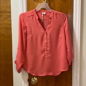 Salmon/peach colored blouse